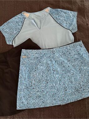 Jofit Light Blue Floral & a Black Skort with matching short sleeve shirt